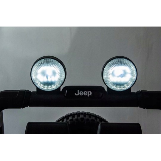 Gyermek elektromos autó Jeep Wrangler fekete színben, bőrüléssel és EVA kerekekkel.