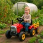 Piros színű akkumulátoros traktor pótkocsival