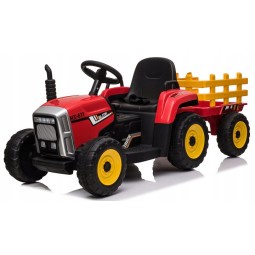 Piros színű akkumulátoros traktor pótkocsival