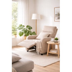 Bézs színű, kinyitható, szövetből készült relaxfotel.